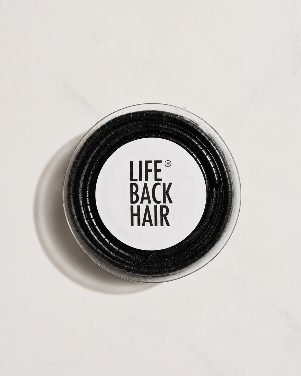 Micro-Ringe, Dose schräg von oben – Black