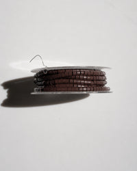 Micro-Ringe, Dose seitlich mit gestapelten Ringen – Brown
