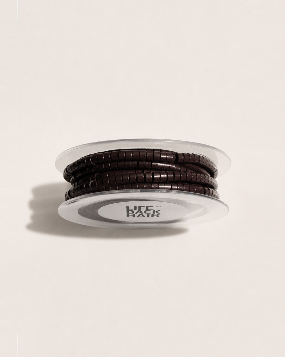 Micro-Ringe, Dose seitlich mit gestapelten Ringen – Dark Brown