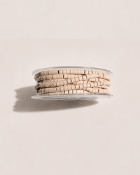 Micro-Ringe, Dose seitlich mit gestapelten Ringen – Light Blonde